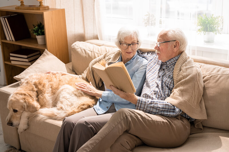 senior couple reading books